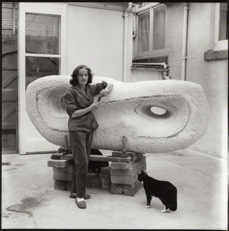 Barbara in her studio circa 1950’s, with white marble sculpture and black cat.