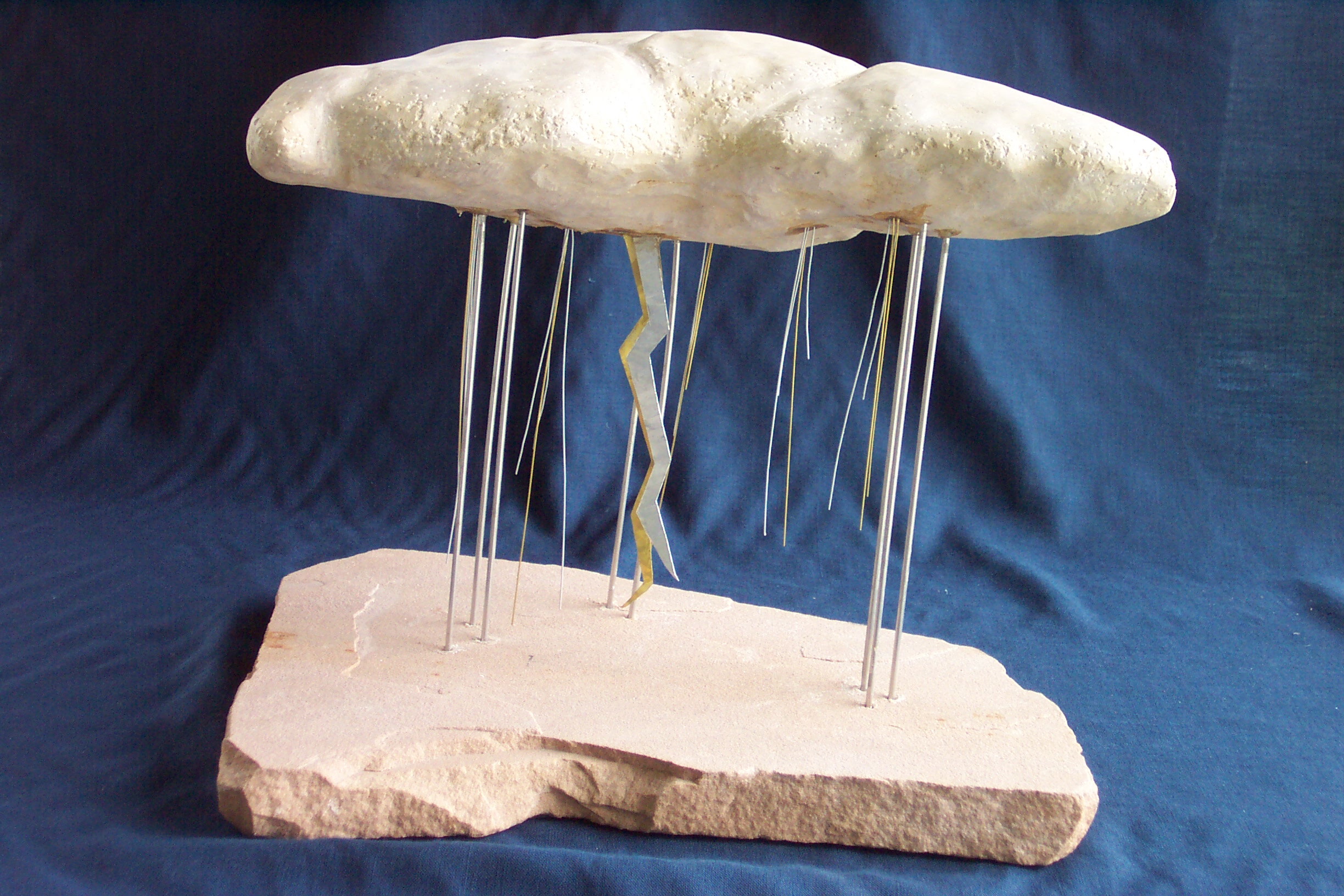 Patty McPhee “Desert Thunder”,14” X 15” X 11”, limestone, quartzite and metals