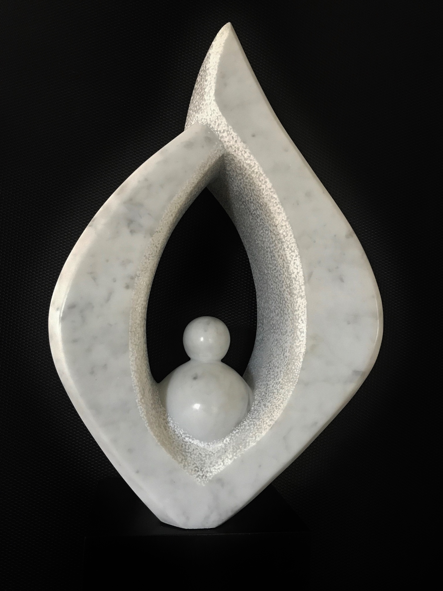 “Birth”, 16” X 10.7” X 4.5”, Carrara marble on polycot base