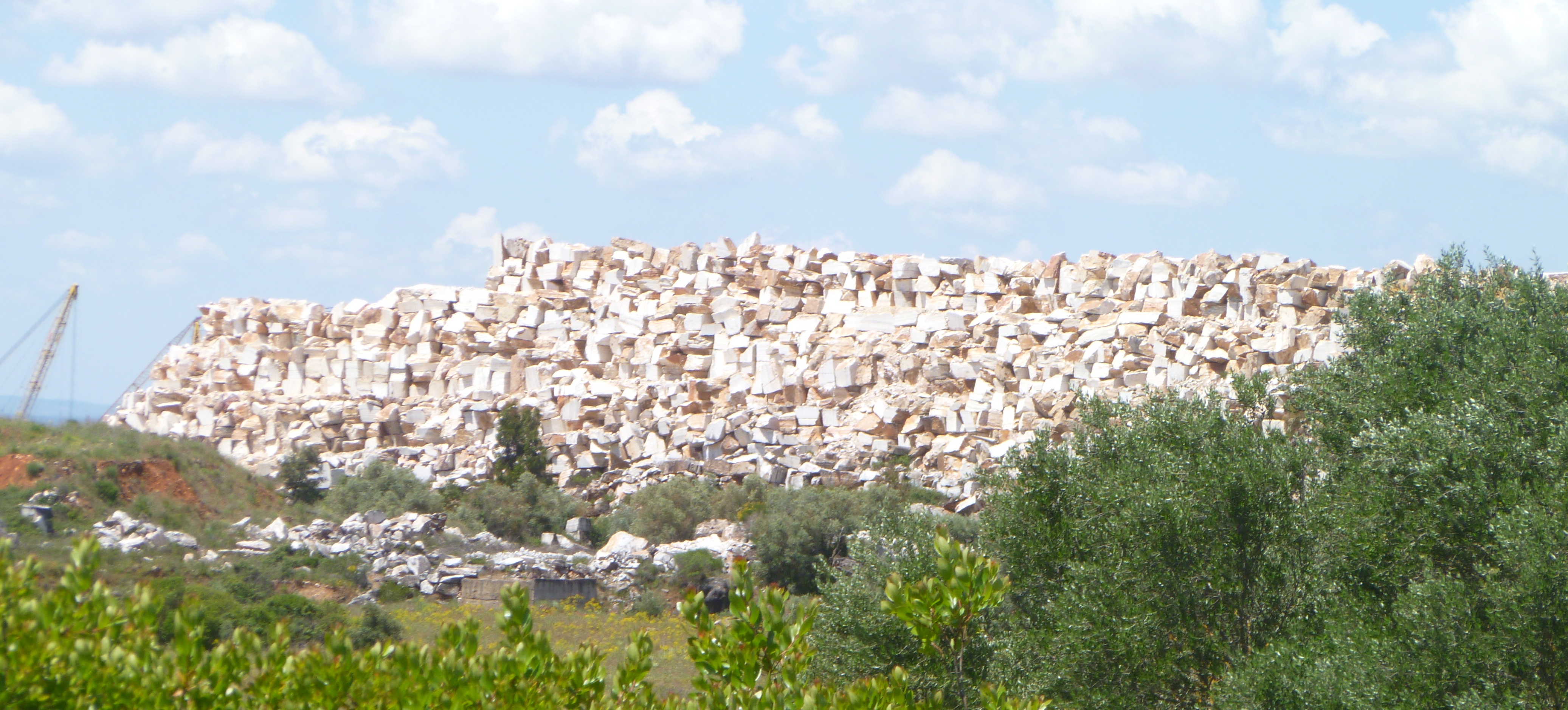 Three story tall mountain of marble scrap