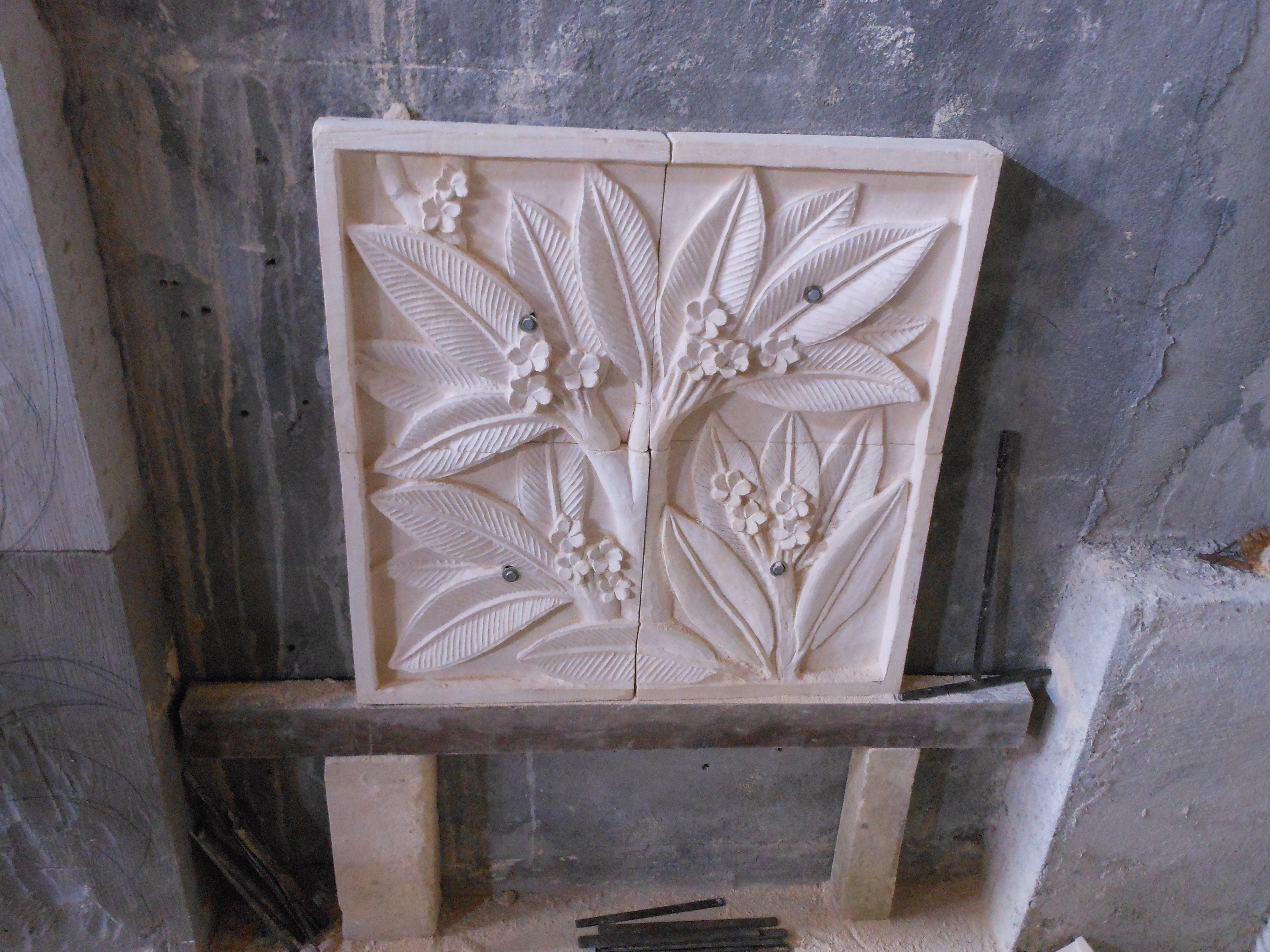 Finished limestone Frangipani panel, Mark Andrew