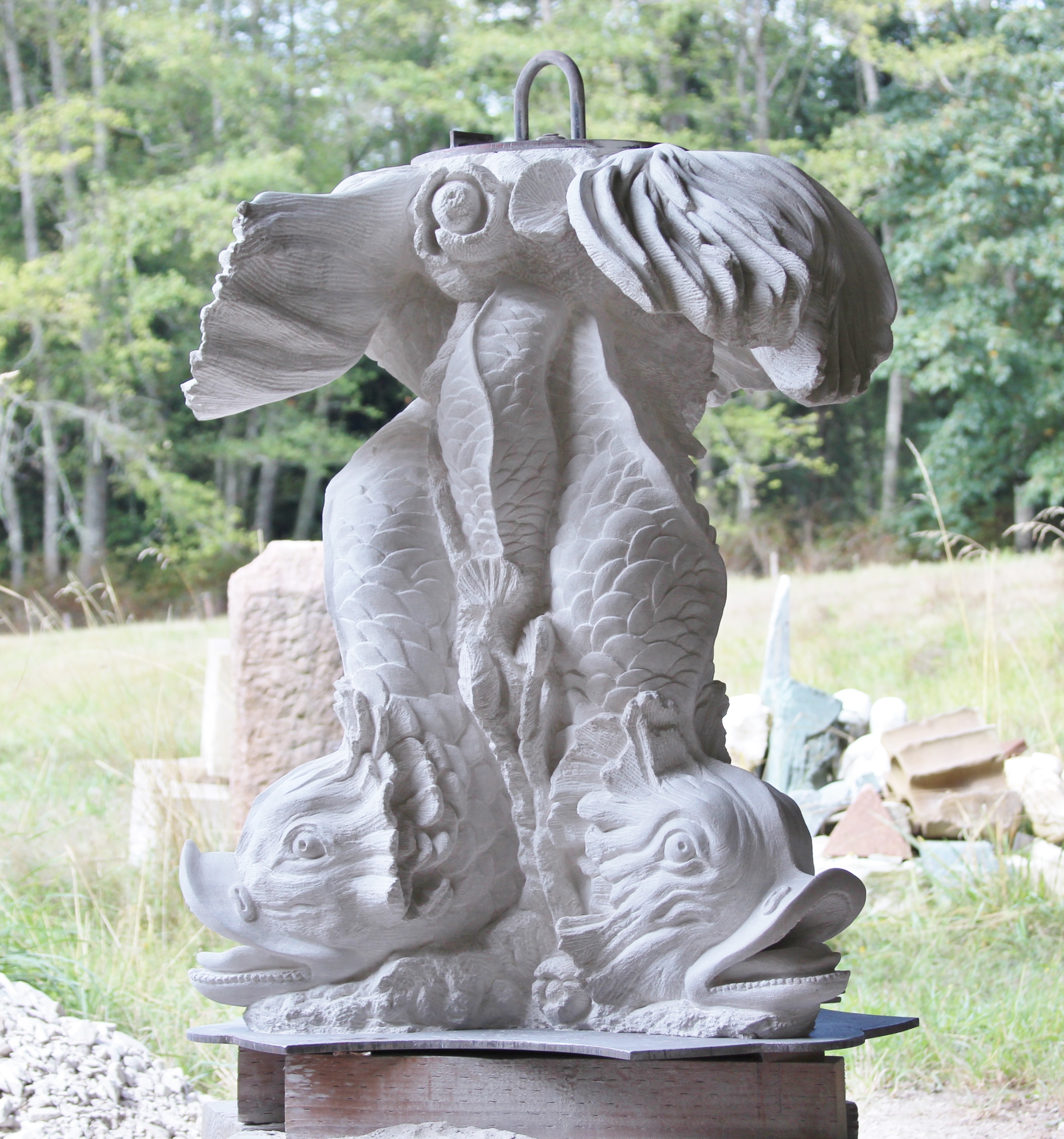 Indiana Limestone Fish Fountain, 2015. My commission entailed enlarging an existing 19th century English fountain. The original was a 14" high plaster cast. My version is 36" high and was drilled through the center to accommodate plumbing to an upper basin, as well as three mouth spouts. The entire fountain is 6’ high and is in a Napa Valley, California private estate.