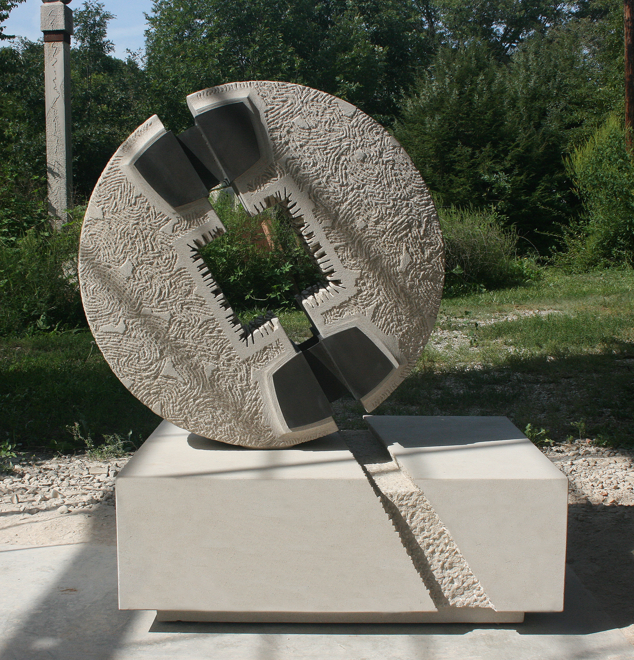 MANDALA, 4’ 2” X 34” X 32”, limestone, bronze