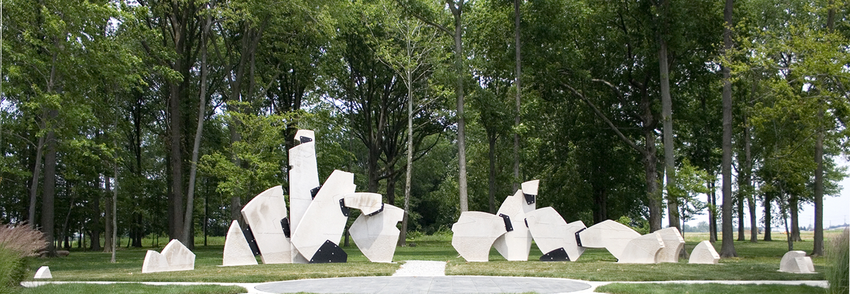 ROLLING RHYTHM, Dale Enochs, 15’ 6” X 65’ X 30’, limestone, powder coated steel, stainless steel