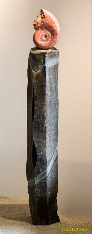 “Neptune's Gift”, 60” X 10” X 10”, travertine and basalt