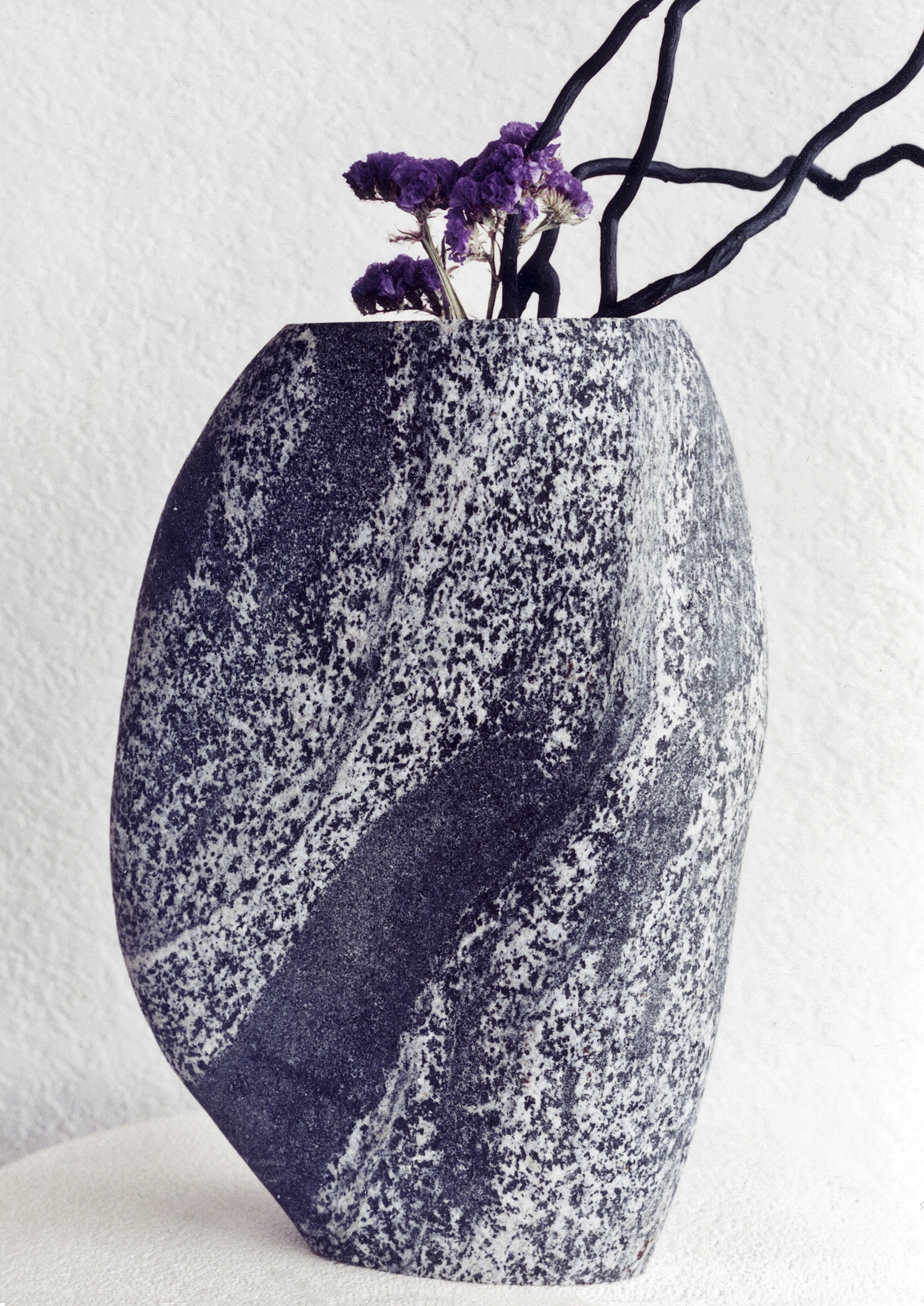 Vase for Ikebana (Japanese flower arranging), granite bolder from a Puget Sound beach, 14"H x 8"W x 4"D.
