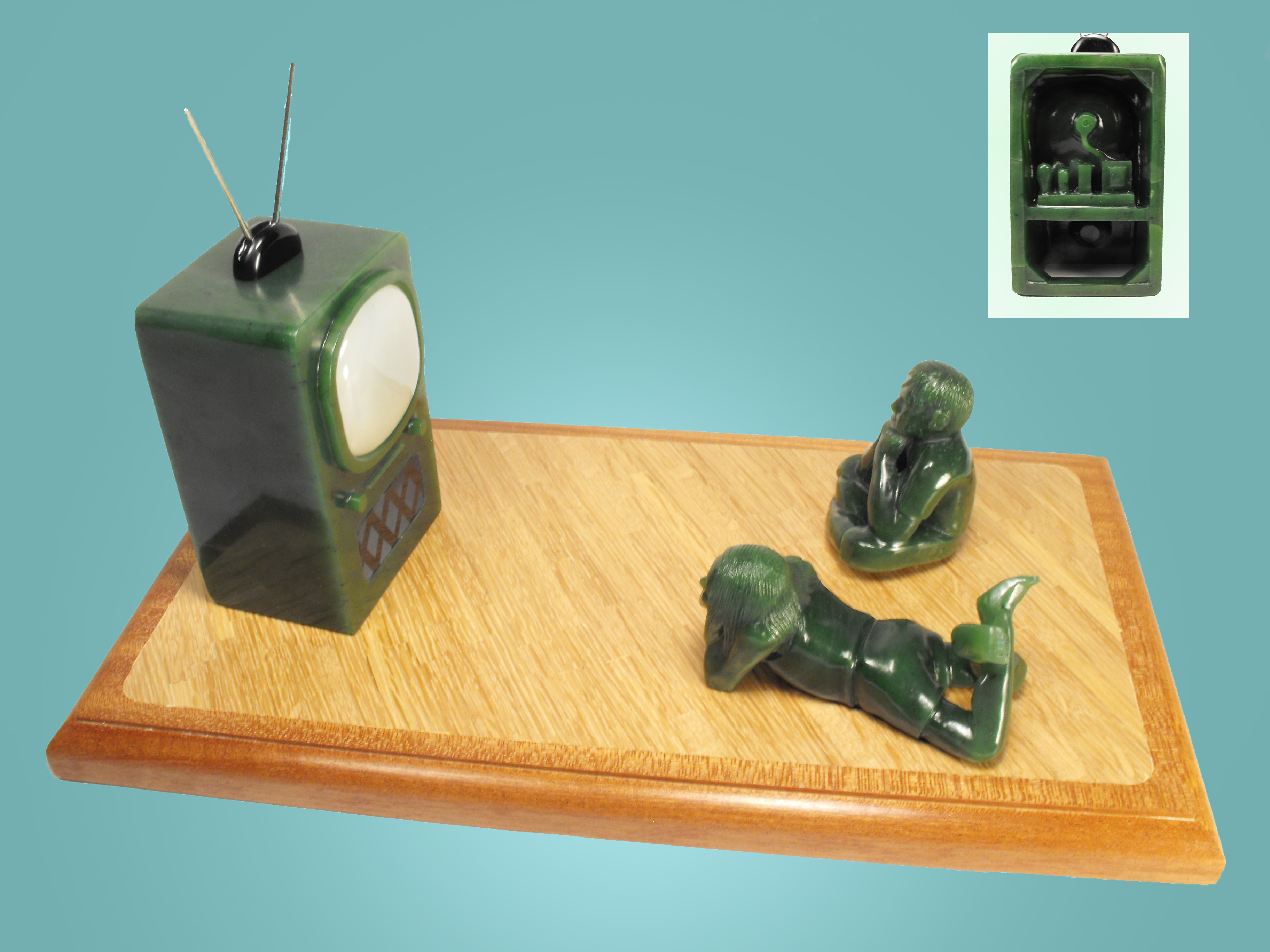 Saturday Morning Cartoons "Saturday Morning Cartoons" Both children - British Columbia nephrite jade Antenna base - Wyoming nephrite jade Television cabinet - Wyoming nephrite jade Television speaker cover - Australian nephrite jade Television screen - Siberian nephrite jade 2017 TV 4.5" h.