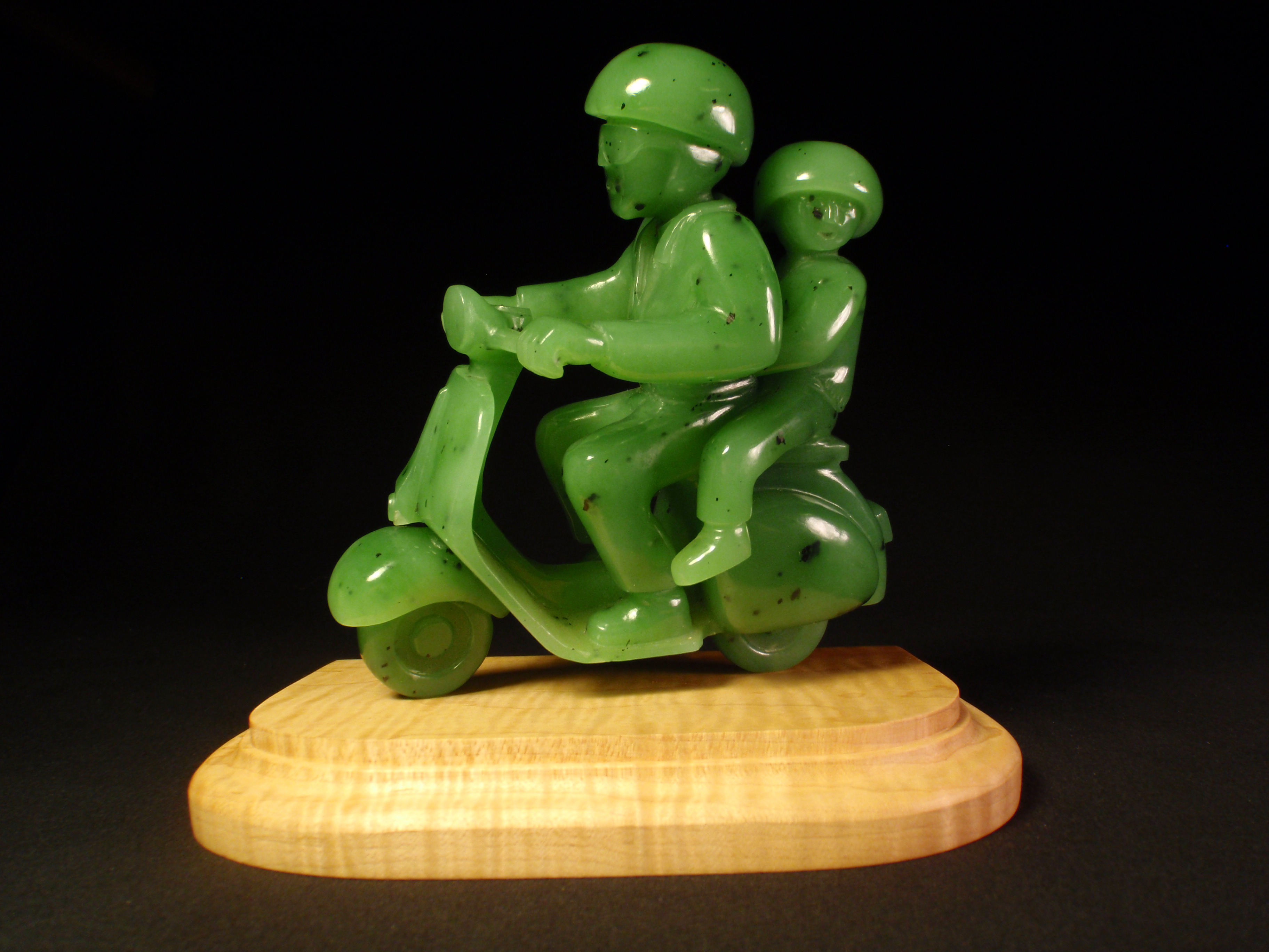 Scooter Ride Siberian nephrite jade 2005 4.75" w. 5" h.