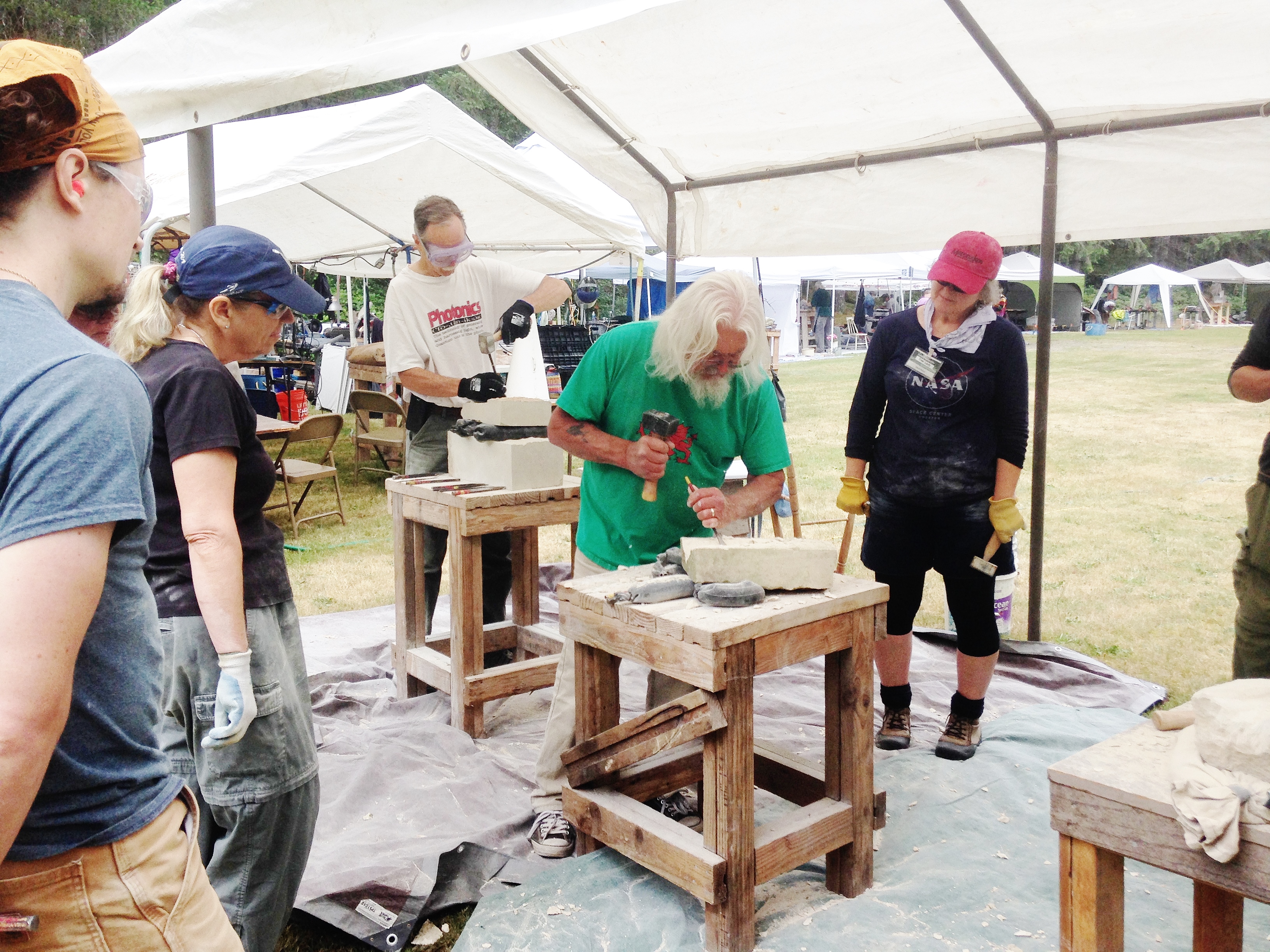 Instructor Tracy Powell Demonstrating how to carve limestone in the Dojo