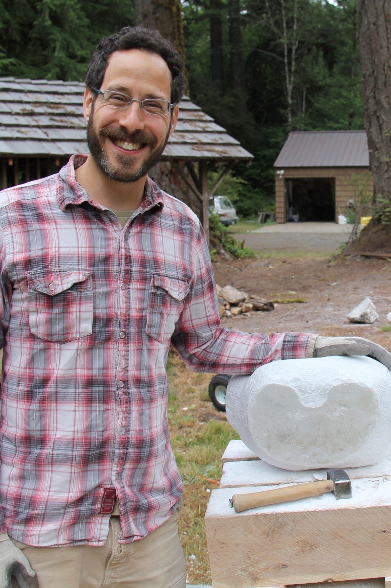 Our auctioneer, Seth Freidman, (sans wig) gives us a big smile and a peek at his latest marble piece 